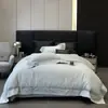 Venda Direta da Fábrica 100% Algodão Bordado Escovado Oco Conjunto de Quatro Peças Cor Simples Conjunto de Roupa de Cama Adequado para Todas as Estações Atacado