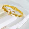 Pulsera Transfronteriza Europea y Americana de Acero Inoxidable Margarita Mariposa Diseño de Apertura Incrustada con Zircón Pulsera de Acero de Titanio de Alto Sentido