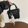 Bolsa balde requintada estilo coreano ins para mulheres, novo modelo da primavera de 2026, bolsa de ombro e transversal casual simples e única