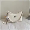 Bolso de hombro de moda de diseño nicho estilo coreano para el día a día, nuevo bolso cruzado de verano 2026 para mujer, bolso simple de tela suave para debajo del brazo