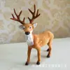 Animal de simulación ciervo sika simulación alce jirafa modelo animal de piel accesorios de decoración para cine y televisión venta al por mayor