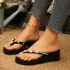 Chanclas Tallas Grandes Transfronterizas Verano 2026 Sandalias con Tira para el Dedo del Pie Zapatos de Playa Mariposa Flor Pedrería Cuña de Suela Gruesa