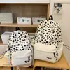 Mochila Feminina Estampa de Leopardo Estilo Ins Coreano 2025 Nova Grande Capacidade Mochila para Alunos do Ensino Fundamental Mochila Escolar para Alunos do Ensino Médio