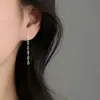 Pendientes de cadena Yixuan con cuatro circones, hilo para oreja con borla de strass súper brillante de nicho, estilo largo con un toque de alta gama