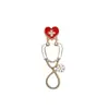 Broche Creativo de Dibujos Animados Europeos y Americanos Estetoscopio Estéreo Doctor Enfermera Forma de Corazón Electrocardiograma Gota de Aceite Insignia Pecho Al por Mayor