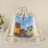 Suministro Directo Mochila Creativa con Estampado de Dibujos Animados Bolsa con Cordón Bolsa con Logo Impreso Almacenamiento de Viaje Bolsillo con Cordón de Lona Ligero
