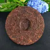 Venta al por mayor de fábrica té cocido islandés té de pastel qizi de Yunnan 357g té Pu 'er viejo té de árbol antiguo islandés pastel de té Pu 'er cocido