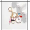Llaveros personalizados con lemas inspiradores transfronterizos y pequeños accesorios de regalo para hombres y mujeres
