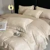 Juego de Ropa de Cama de Tres Piezas de Lujo con Funda Nórdica de Seda Helada Color Nude, Jacquard y Moño para Dormir