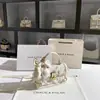 Bolsa de caja de encaje de hadas de una generación 2024 nueva de alto sentido bordado de mariposa bolsa cuadrada pequeña al por mayor