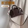 Bolsas Femininas 2026 Novo Estilo Coreano Bolsa de Mão de Luxo Pequena Nicho Bolsa de Ombro Transversal para Menina Bolsa Quadrada Pequena Versátil