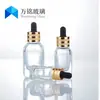 Fabricante suministra frascos cuentagotas cuadrados de 10 ml, frascos transparentes para aceites esenciales, frascos de vidrio líquido originales, frascos para cosméticos y materiales de embalaje.