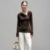 Otoño 2026 Nuevo Minimalista Francés Adelgazante Hebilla Metálica Cuello de Gireo Retorcido Ajustado Manga Larga Top de Punto Mujer 192