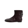 Versão em couro bovino~Botas de dedo dividido de nicho coreano, botas de salto escondido curtas, zíper traseiro, sola plana, botas Martin, botas femininas emagrecedoras