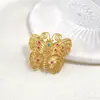 Nuevo broche de mariposa tridimensional estilo palacio vintage incrustado con pequeños diamantes metal animal alta calidad ropa venta caliente transfronteriza
