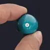 Accesorios para equipo de pesca al por mayor colgante de plomo con forma de oliva Caña de roca Caña de lanzar al mar Cuerda de lanzamiento largo anzuelo colgante de pez núcleo de plástico de color colgante de plomo de oliva