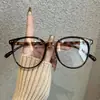 Armazón de gafas retro súper caliente hace que la cara se vea más pequeña, perfecto para look sin maquillaje, mismo estilo, adelgazante, para caras grandes, armazón redondo, armazón de lente óptica al por mayor