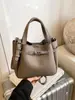 Bolso de Mujer Nuevo Super Popular 2025 con Patrón de Lichi y Acabado de Alta Gama, Versátil para el Trabajo Diario, Bolso de Mano para Otoño e Invierno, Bolso de Hombro y Cruzado