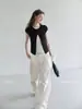 TGGTA Camiseta Preta Falsa de Duas Peças com Ombro Normal de Manga Curta para Mulheres Verão 2026 Novo Design com Senso de Moda Slim Fit Cropped