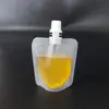 En stock venta al por mayor bolsa transparente portátil para cerveza bolsa con boquilla auto-soportante para sopa líquida de múltiples granos bolsa desechable para empaque de cerveza