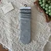Calcetines de altura media con estampado floral y lazo de burbuja estilo coreano Peiqiao, dulces y femeninos, calcetines sin costuras de algodón puro, venta al por mayor de la industria del calcetín de Zhuji