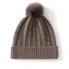 Gorro cálido, sin ala, de estilo nuevo, para otoño e invierno, gorro de punto de cachemira de color liso para mujer, con pompón, versátil