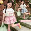 Conjunto de manga corta para niña, nuevo estilo verano 2026, falda pastel de verano estilo coreano, conjunto de dos piezas de moda, venta al por mayor