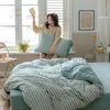 Juego de cuatro piezas de algodón Tianzhu a rayas, funda de edredón de punto 100% algodón simple, sábana, sábana bajera, venta al por mayor de ropa de cama