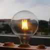 Lâmpada de LED estilo Edison luz clara luz branca quente 2700K dimerizável E14E27 rosca lâmpada de filamento retrô transfronteiriça