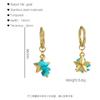 Pendientes de turquesa natural de acero de titanio de nueva moda transfronteriza europea y americana con diseño de estrella de cinco puntas, pendientes sencillos que combinan con todo para mujer