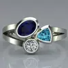 Amazon desea más vendido Europeo y Americano nueva personalidad hermoso anillo de piedra tricolor irregular soporte una generación de cabello