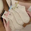 Calcetines de encaje de doble capa, dulces y lindos, estilo japonés, con diseños de corazón de dibujos animados y osito, presentando patrones únicos y un estilo preppy, universitario, de longitud hasta la mitad de la pantorrilla.
