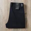 Estación europea otoño e invierno grueso caqui avanzado negocios sarga algodón elástico mediana edad holgado recto casual pantalones para hombre