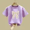 2366# Camiseta Infantil Versátil de Manga Curta com Laço para Meninas Verão 2025 Nova Soltinha de Meia-manga Casual Tendência