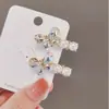Pinza para el pelo de Corea del Sur Dongdaemun Nuevo Exquisito Lindo Lazo Pinza para Flequillo Elegante Brillante Cristal Pinza de Pato Pinza para el Pelo