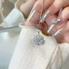 Pendientes con Aros de Plata 925 y Anillo con Colgante Giratorio de Trébol de Cuatro Hojas Estilo Influencer de Moda Set