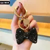 Nuevo Llavero de Arco de Diamante Flash Versión Coreana de Amazon, Colgante de Bolso de Moda de Alta Gama, Llavero de Coche