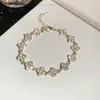[Cadena de Diamantes Arcoíris] Pulsera de extracción de zircón trenzado en cruz, una pulsera lujosa y de alta gama, una pieza de joyería delicada y de moda