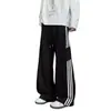 Pantalones de chándal resistentes estilo americano para hombre, pantalones de tres rayas para primavera y otoño, pantalones deportivos casuales rectos holgados versátiles para adolescentes y estudiantes