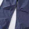 Pantalones casuales holgados de estilo callejero americano para hombre, corte limpio color liso holgados de pierna ancha plisados tipo paracaídas de pierna recta largos