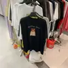 Verão 2026 Novo Estilo Europeu Algodão Puro Versátil Moda Solta Estampa de Desenho Camiseta de Manga Curta Top Feminino Tendência