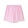 Ropa de mujer transfronteriza al por mayor 2026 verano nuevo elegante top de un solo hombro color liso + conjunto de shorts casuales