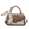 Bolsa Quadrada Pequena Color-Blocking Patchwork Fashionable Novo Modelo 2026 Bolsa de Mão Simples e Estilosa Bolsa de Ombro Transversal Tendência