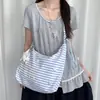 Bolsa de lona listrada com blocos de cor estilo coreano e estrelas para mulheres, nova bolsa transversal de ombro plissada de grande capacidade, bolsa tote para o dia a dia, moderna
