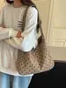 Bolso de invierno de pana versátil de nicho estilo coreano modelo nuevo 2026 a rayas lunares texturizado simple y elegante bandolera