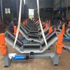 Dispositivo de correção automática para esteira transportadora de correia. Dispositivo de correção de cinta puramente mecânico acionado por atrito, zero de energia