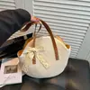 Bolso Tejido de Paja de Gran Capacidad para Mujer 2026 Primavera Nuevo Estilo Color Sólido Bolso Tejido Simple de Hombro Bolso Casual para Vacaciones en la Playa Moderno