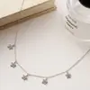 Collar de flor estrellada de plata de ley s925 para mujer, cadena para la clavícula de lujo ligero europeo y americano, nicho de alta gama, celebridad de internet, ins, versátil