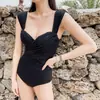 Traje de baño para mujer, nuevo estilo verano 2024, negro, adelgazante, sexy, adecuado para estudiantes, recatado, diseñado para realzar el busto, cubrir el abdomen y crear un efecto adelgazante, traje de baño de una pieza