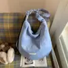 2026 Primavera Temprana Nuevo Bolso de Axila Artístico de Nicho Bolso Tote de Gran Capacidad Bolso de Mano para Estudiantes y Viajeros Frecuentes Bolso de Hombro